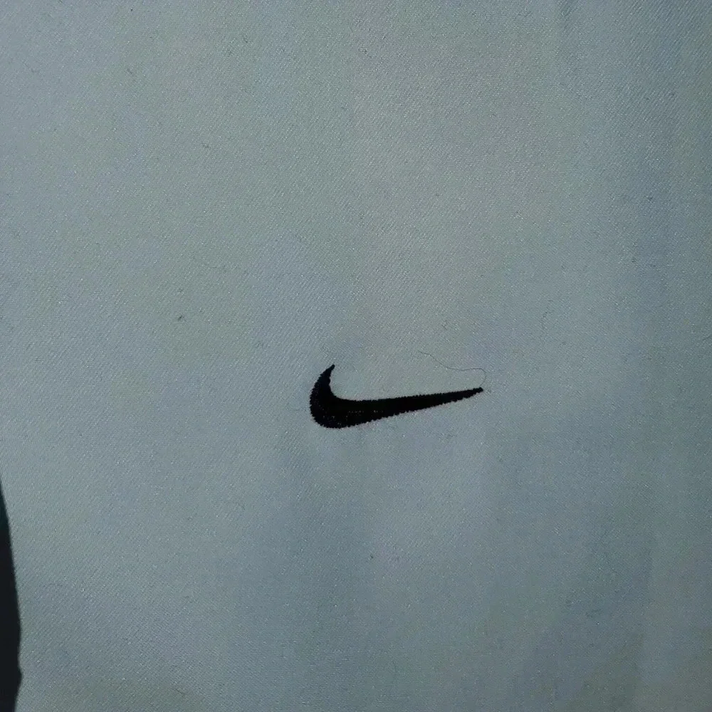 Nike Womens Size XL Windbreaker Jacket Light Blue Outerwear
